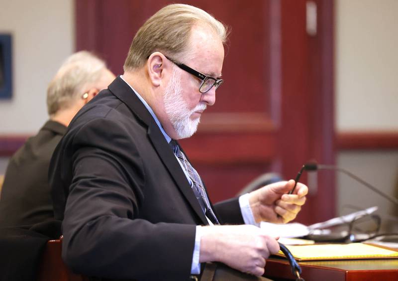 Douglas Moeller, former DeKalb School District 428 superintendent, prepares for his sentencing hearing Tuesday, Jan. 1, 2023, at the DeKalb County Courthouse in Sycamore. Moeller was sentenced to community service after being found guilty of one count of non-consensual dissemination of a private sexual image, a class 4 felony.