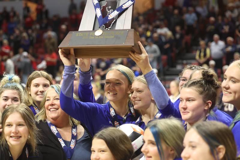 Newman receives the 4th place trophy after their 3rd place match against Norris City-Omaha-Enfield on Saturday in Normal.