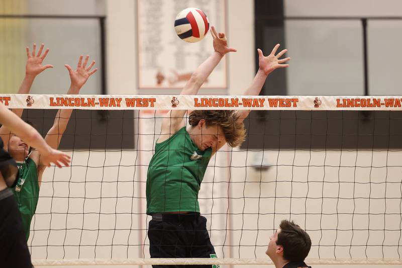 Providence’s Hayden Hill gets a block against Lincoln-Way West on Wednesday, April 3, 2024 in New Lenox.