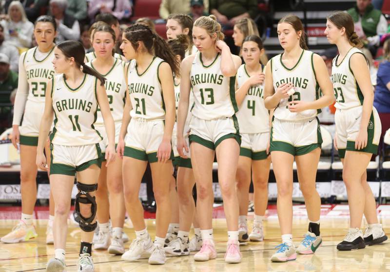 Members of the St. Bede girls basketball team walk onto the floor for the Class 1A State semifinal game on Thursday, Feb. 29, 2024 at CEFCU Arena in Normal.
