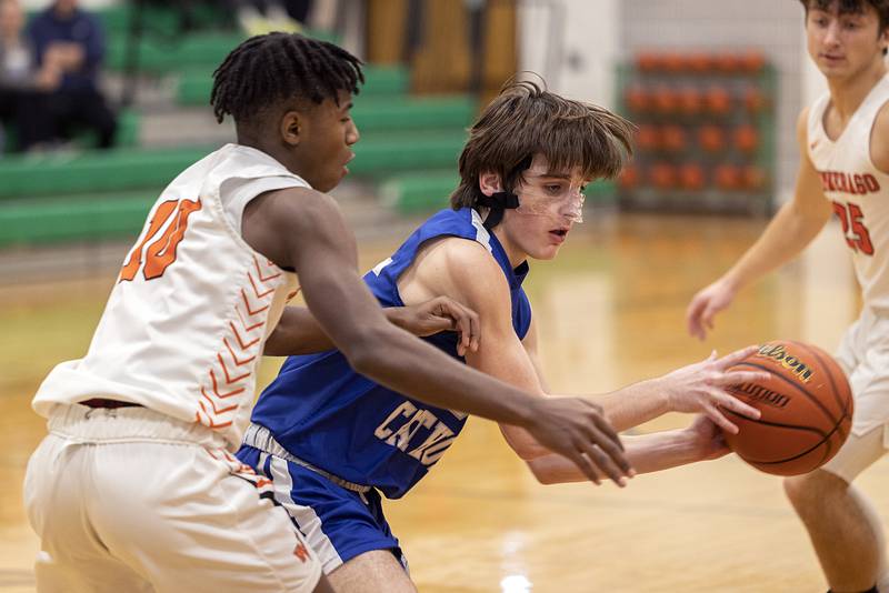 Newman’s Kenny Boesen looks to pass while playing Winnebago Saturday, Jan. 7, 2023 at the Rock Falls Shootout.