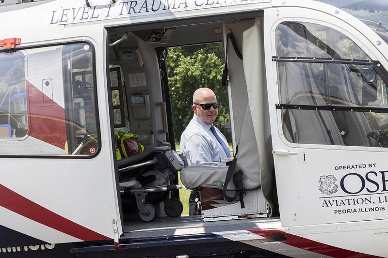 David Schreiner, KSB Hospital president, looks over the OSF Life Flight helicopter Wednesday, July 10, 2024 in Rock Falls.