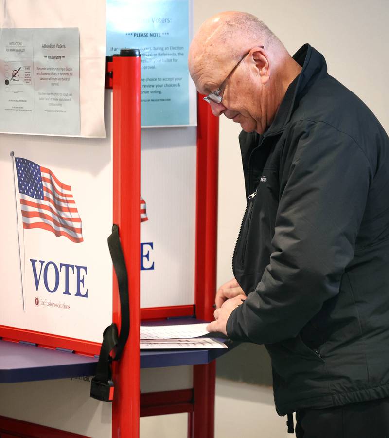 Robert Hofer, from Sycamore, votes Tuesday, March 19, 2024, in the polling place at the DeKalb County Administration Building in Sycamore.