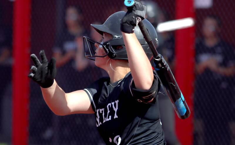 Huntley’s Meghan Ryan watches the flight of her home run against Barrington in sectional final softball  action at Barrington Friday.