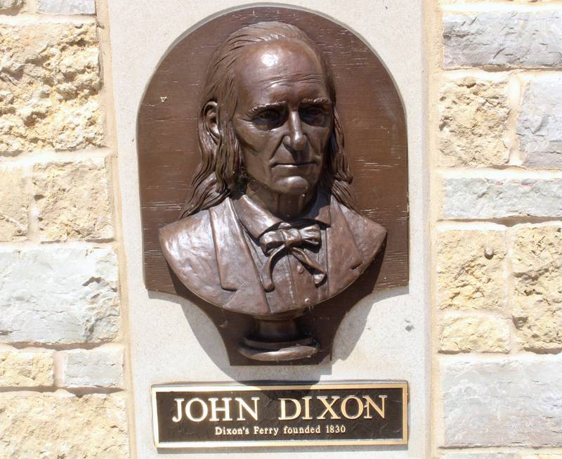 A bust of John Dixon appears in relief at Heritage Crossing along the Rock River in Dixon.