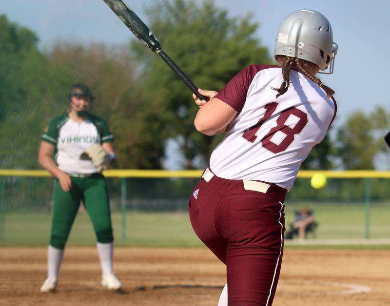 Marengo’s AJ Pollnow singles up the middle against North Boone in IHSA Softball Class 2A Regional Championship action at Marengo Friday.