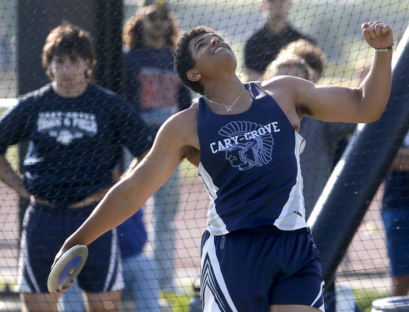 Cary-Grove’s Reece Ihenacho throws the discus during the Huntley IHSA Class 3A Boys Sectional Track and Field Meet on Wednesday, May 15, 2024, at Huntley High School.