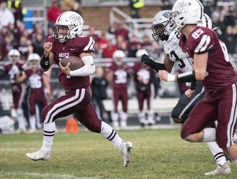 Prairie Ridge's Nathan Greetham gains some yards against Kaneland during the 6A second-round football playoff game on Saturday, November 5, 2022 at Prairie Ridge High School in Crystal Lake. Prairie Ridge won 57-22.