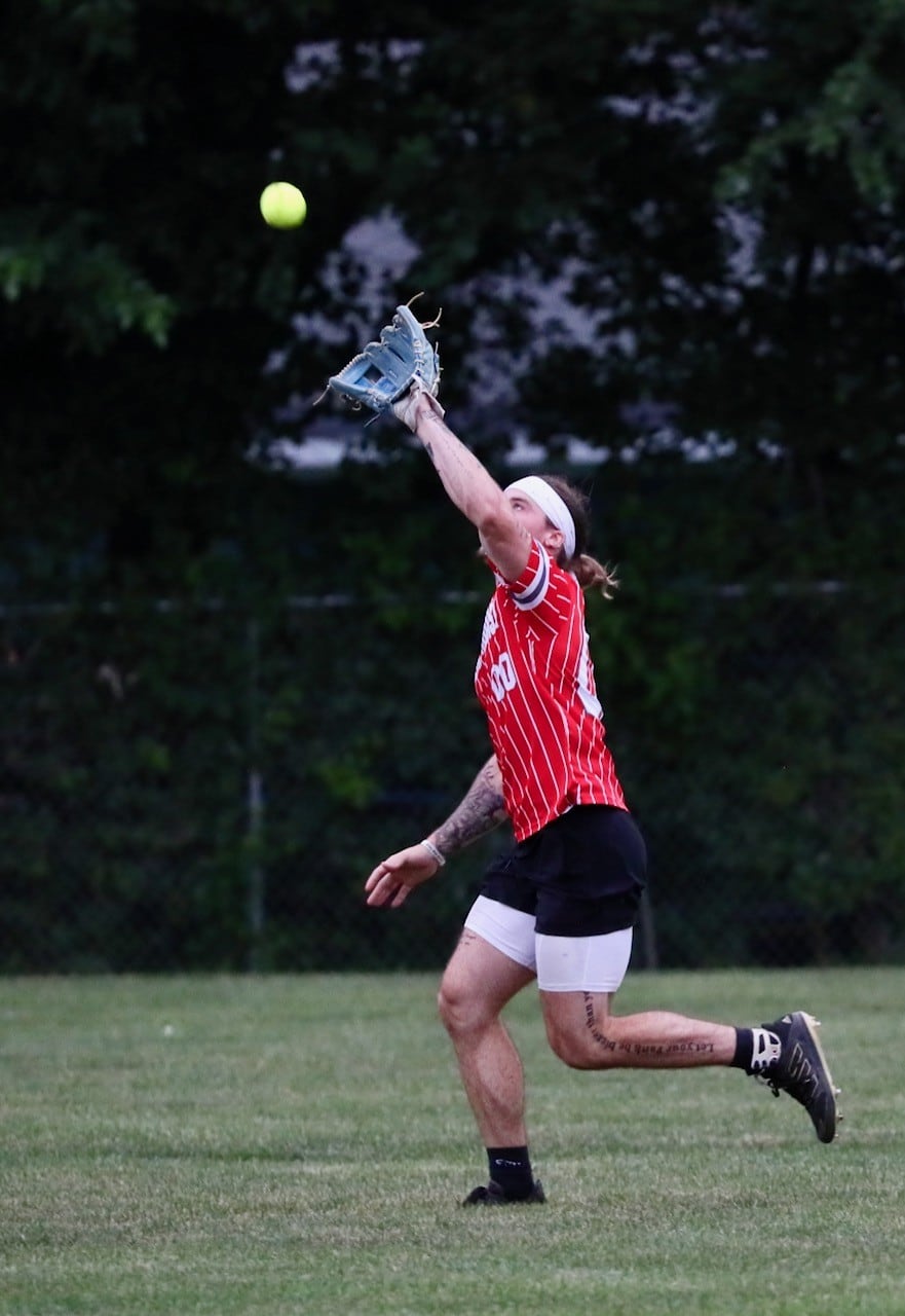 Noah Atkinson of Malden Methodist camps under a fly ball during championship night of the Princeton Princeton Park District Fastpitch tournament.