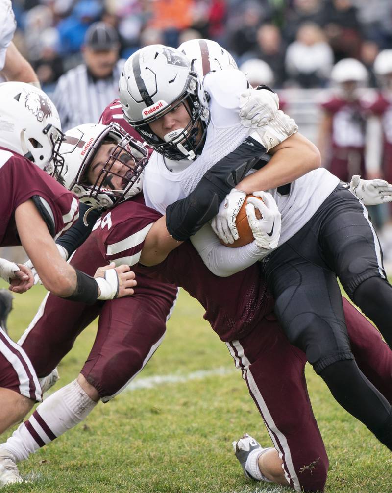 Kaneland's Dylan Sanagustin is tackled by Prairie Ridge's Joseph Vanderwiel during the 6A second-round football playoff game on Saturday, November 5, 2022 at Prairie Ridge High School in Crystal Lake. Prairie Ridge won 57-22.