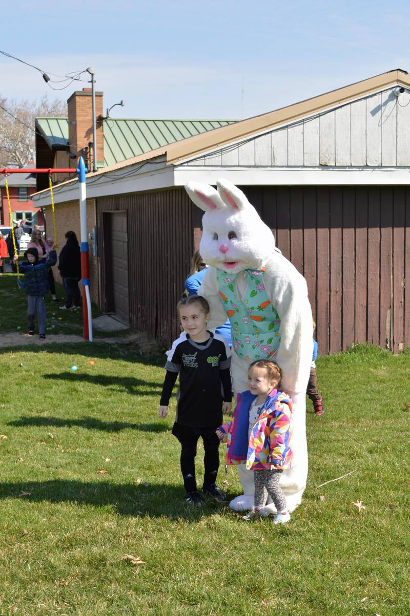 Ahniya Wheeler, 6, left, and Magnolia Wheeler, 2, both of Mt. Morris, pose for a photo with the Easter Bunny outside the Bertolet Building on April 8, 2023. The Leaf River Lions Club hosted a Breakfast with Bunny and the Easter egg hunt.