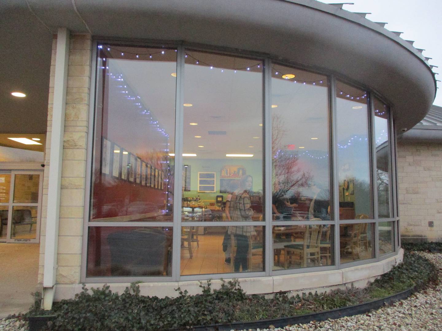 The space for a cafe with large windows looking out from the Joliet Public Library Black Road Branch was designed into the building, which was built in 2002. Dec. 2, 2023.