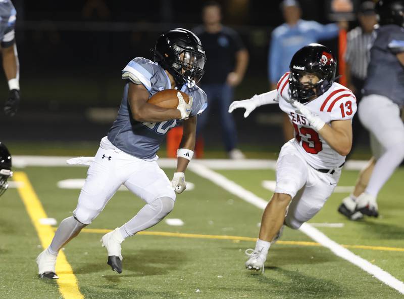 Willowbrook's Jovon Boyd (30) runs the ball during the varsity football game between Glenbard East and Willowbrook high schools on Friday, Sep. 30, 2024 in Villa Park.