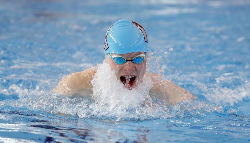 Alex Lakin of Naperville Central competes in the Boys 100 Yard Breaststroke during the IHSA Boys state swim finals Saturday February 25, 2023 in Westmont.