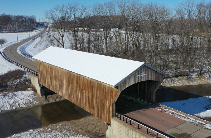 An aerial view of the Captain Swift bridge on Monday, Nov. 27, 2023 near Princeton. The bridge has a 16'-3” vertical clearance. The bridge was built in 2006 and is made entirely of wood. It's the only two-lane covered bridge in Illinois.