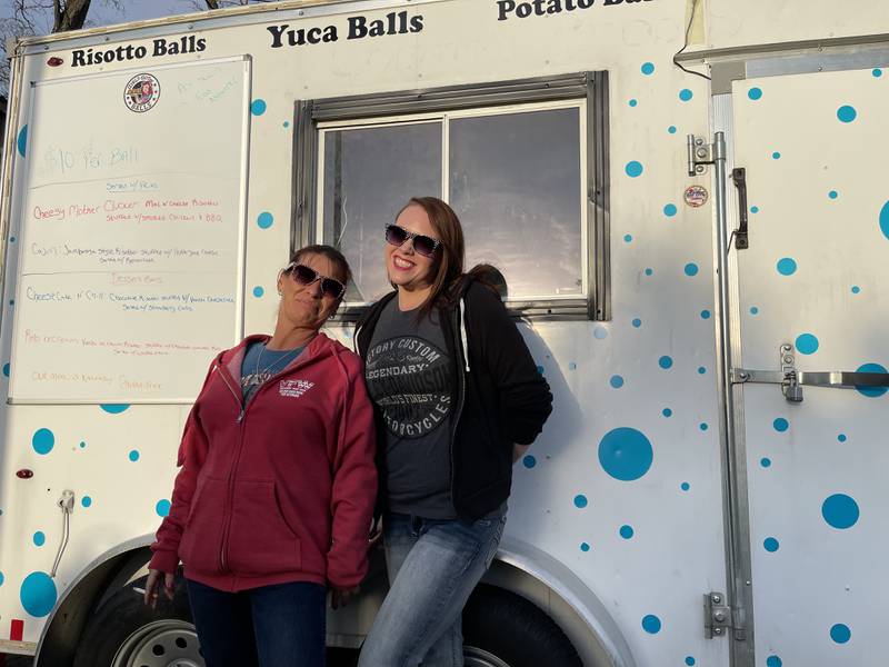 Carrie Jones, left, and Shauna Fetterman are looking to raise funds to fix their Girl's Got Balls food truck before the springtime.