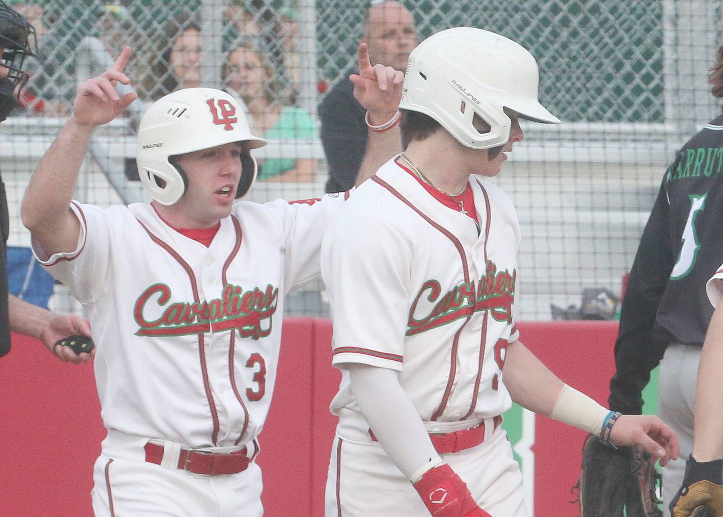 L-P's Brady Romagnoli reacts with teammate Brevyn Vogel after scoring against Alleman on Tuesday, March 12, 2024 at the L-P Athletic Complex in La Salle.