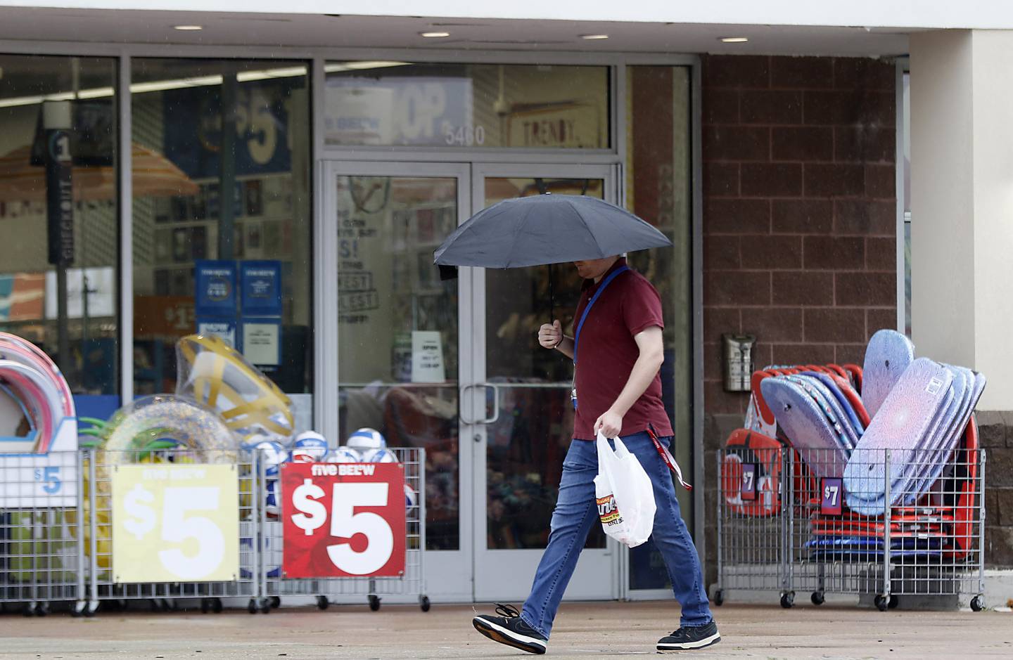 A shopper walks past the Five 
Below store in Crystal Lake on Friday, June 28, 2024. The McHenry County sales tax rate increases on Monday.