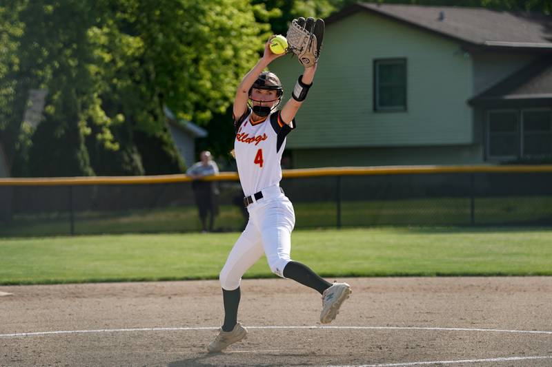 Batavia's Emily Reagan (4) delivers a pitch against Geneva during a softball game at Batavia High School on Wednesday, May 8, 2024.