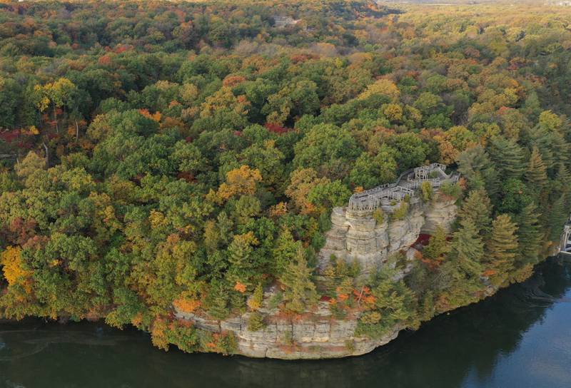 An aerial view of the fall colors over Eagle Cliff high above the Illinois River on Tuesday, Oct. 24, 2023 at Starved Rock State Park