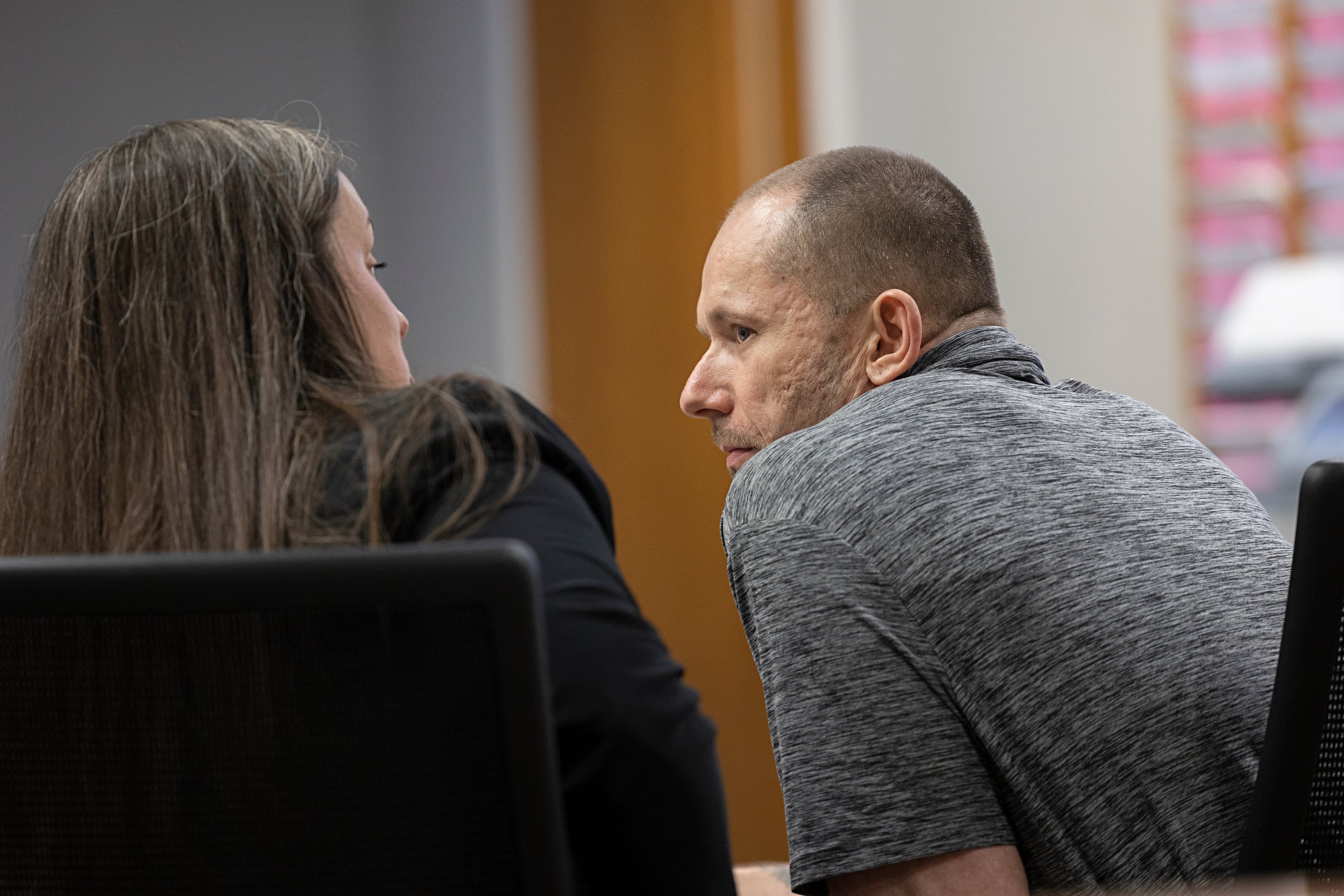 Steven W. Coleman speaks with attorney Dana McCormick Thursday, July 18, 2024 at his Whiteside County trial.