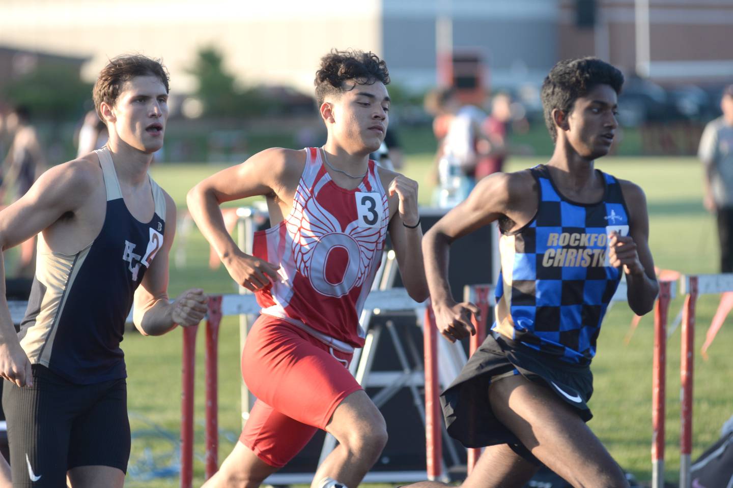 Oregon's Daniel Gonzalez (center) runs in the 800 meters at the 1A Winnebago Sectional on Friday, May 17, 2024 in Winnebago. He finished second in the race to advance to the state finals at Eastern Illinois University in Charleston.
