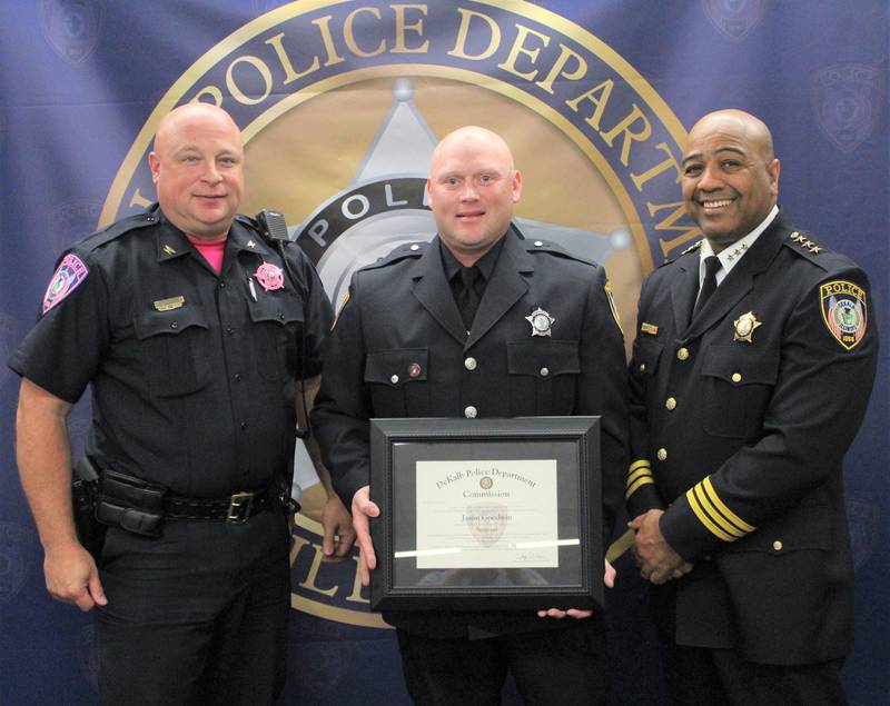 (From left) DeKalb Deputy Police Chief Jason Leverton, newly promoted DeKalb Police Sgt. Jason Goodwin and DeKalb Police Chief David Byrd pose during Goodwin's promotion ceremony in November 2022. Goodwin was named the 2024 keynote speaker for the DeKalb Memorial Day ceremony, according to the city.
