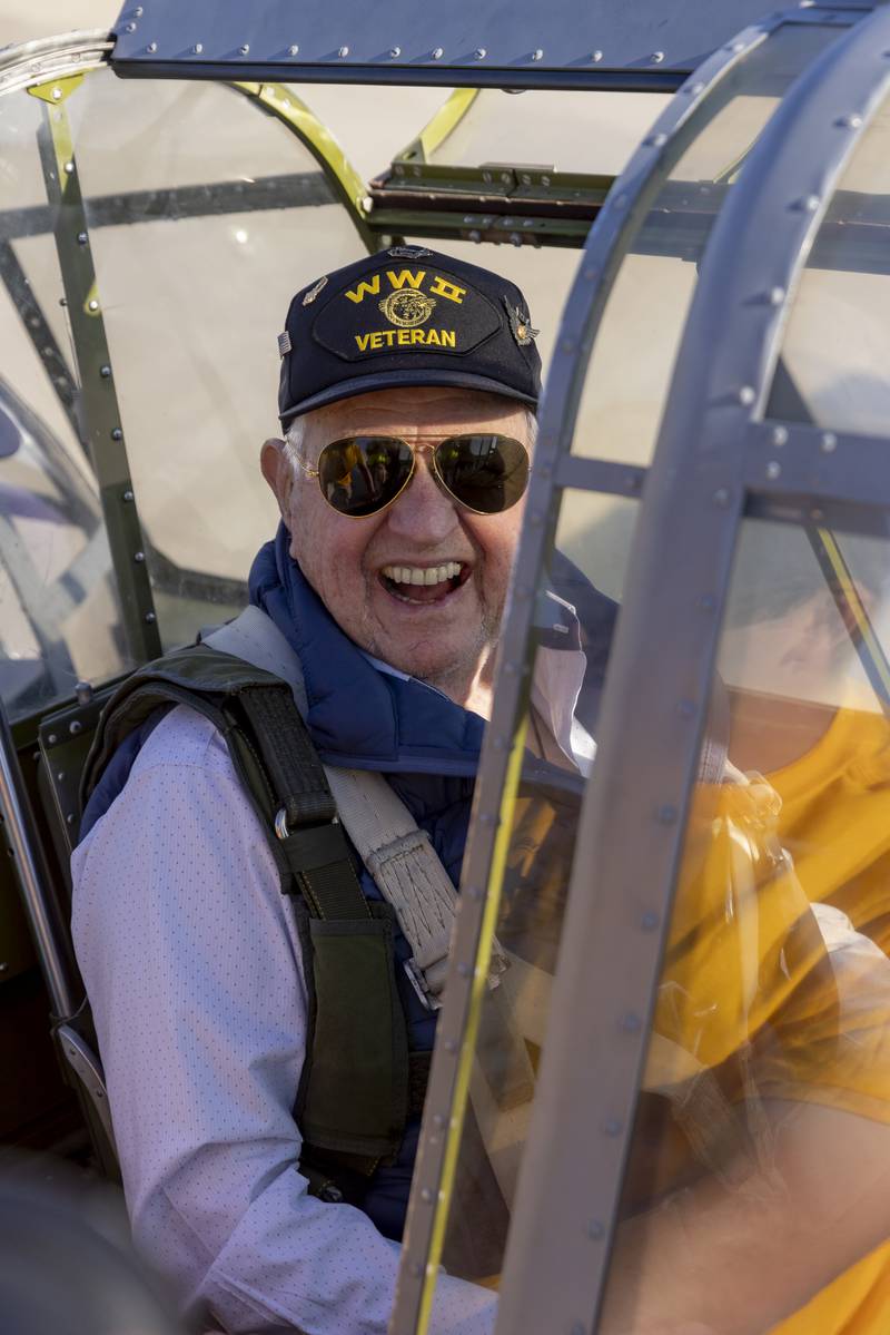 Retired World War 2 Airman, Joe Wills who was a Radioman and Gunner on a TBM Avenger smiles as he enters the cockpit of a TBM Avenger for the first time since the end of World War 2. Willis had the opportunity to return to the sky during the TBM Avenger Reunion and Salute To The Veterans at Illinois Valley Regional Airport on May 18, 2024.