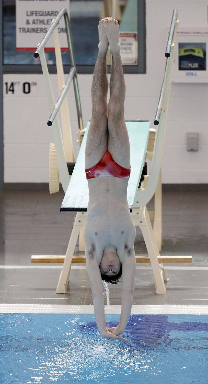 Sami Kassir of Hinsdale Central competes in the Boys 1 mtr Diving during the IHSA Boys state swim finals Saturday February 25, 2023 in Westmont.