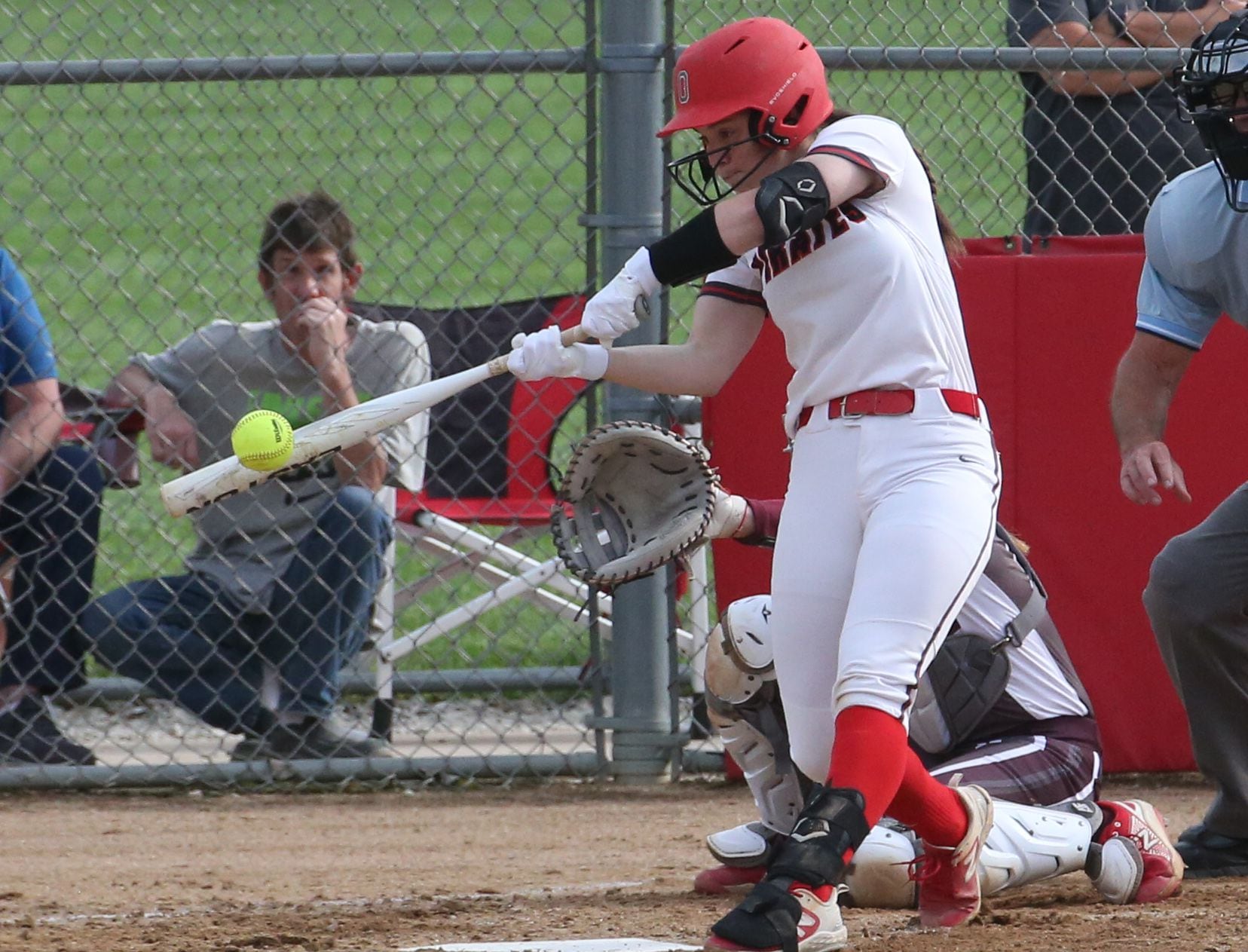 Ottawa's Maura Condon smacks a hit against Morris in a game earlier the month at Ottawa High School. 