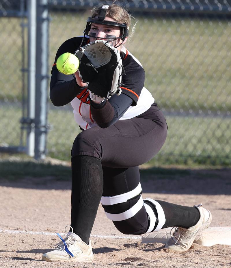 Sandwich's Alexis Sinetos makes a putout at first during their game against DeKalb Tuesday, March 19, 2024, at DeKalb High School.