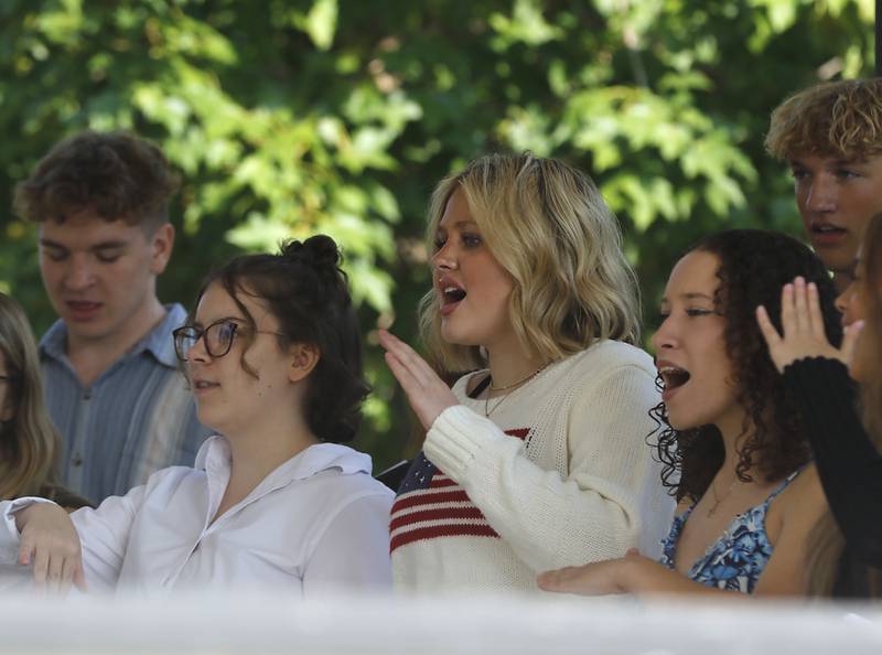 McHenry High School choir members sing during a 9/11remembrance ceremony on Sept. 11, 2024, at Veteran's Memorial Park in McHenry.