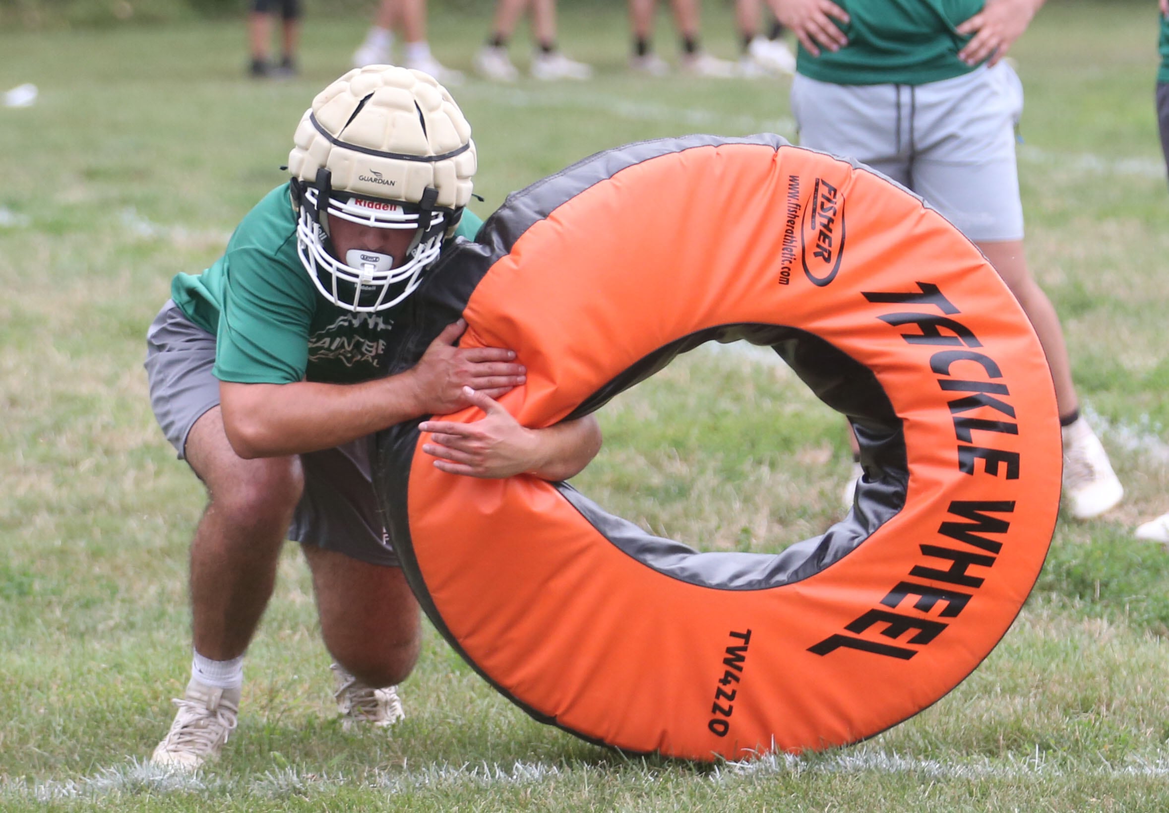 St. Bede's Gavin Marquez hits the tackle wheel during practice on Monday, Aug. 12, 2024 at St. Bede Academy.