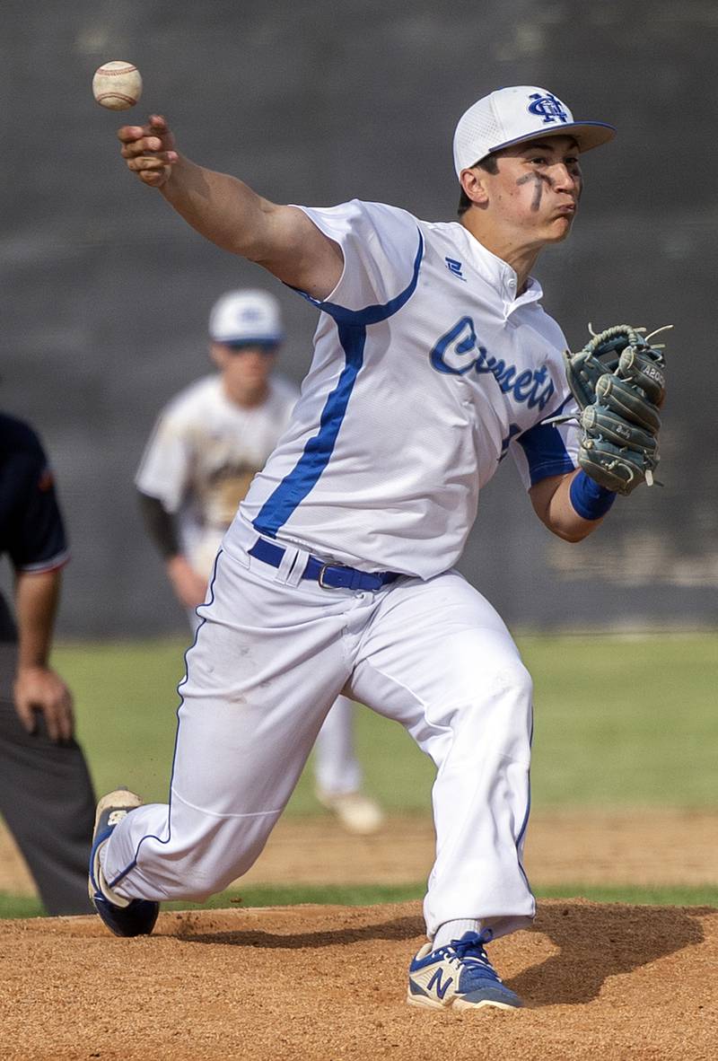 Newman’s Evan Bushman fires a pitch against Chicago Hope Monday, May 27, 2024 during the Class 2A super-sectional in Rockford.