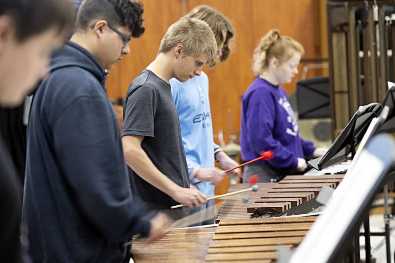 Dixon High School band students practice for upcoming contests Tuesday, April 11, 2023.