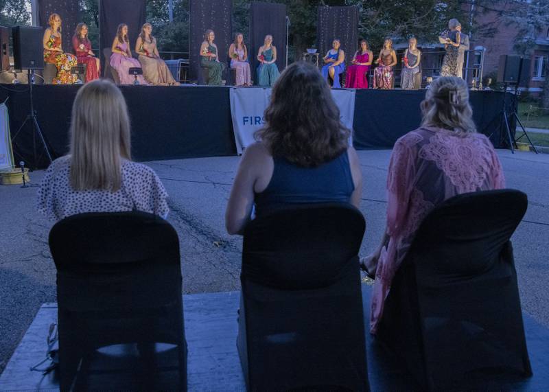 Pageant judges watch the competitors diligently as they prepare to answer questions during the Mendota Sweet Corn Festival pageant on Friday, Aug. 11 11, 2023.