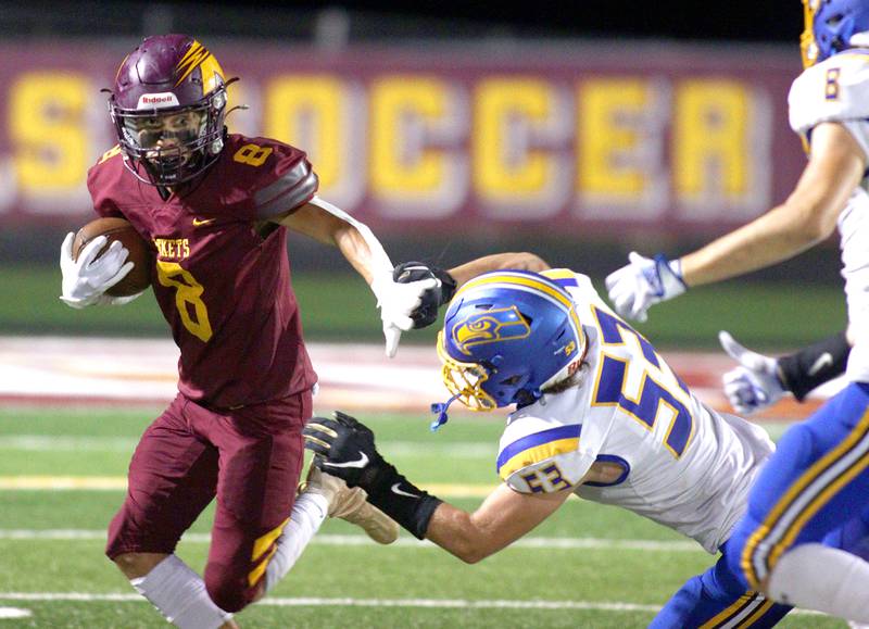 Richmond-Burton’s Joseph Larsen runs the ball against Johnsburg in varsity football action on Friday, Sept. 13, 2024, at Richmond-Burton High School in Richmond.