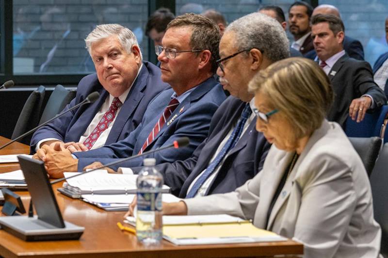 During a Senate Transportation Committee hearing Tuesday, Regional Transportation Authority Board Chair Kirk Dillard looks at the heads of Chicagoland's transit agencies: Metra CEO James Derwinski, Chicago Transit Authority President Dorval Carter and Pace Executive Director Melinda Metzger.