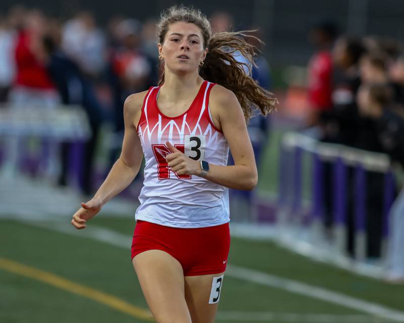 Naperville Central's Lola Satre-Morales wins in the 800-meter run at Friday's Class 3A Downers Grove North Sectional Girls Track and Field meet.