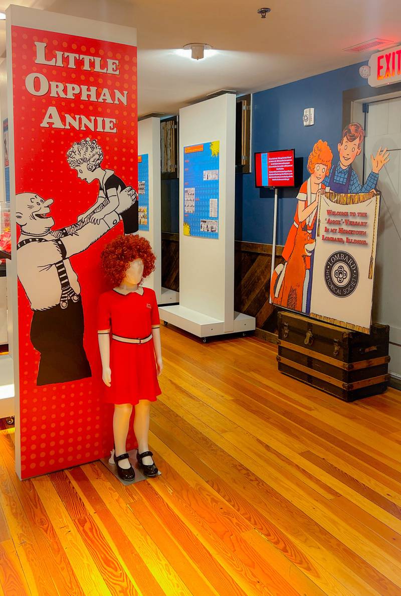 The Lombard Historical Society, in partnership with the Village of Lombard and the DuPage Convention and Visitors Bureau, is celebrating the 100-year anniversary of Little Orphan Annie with its “Annie-versary” exhibit titled Leapin’ Lizards: A Hundred Years of Little Orphan Annie at the Carriage House, 23 W. Maple Street in Lombard.