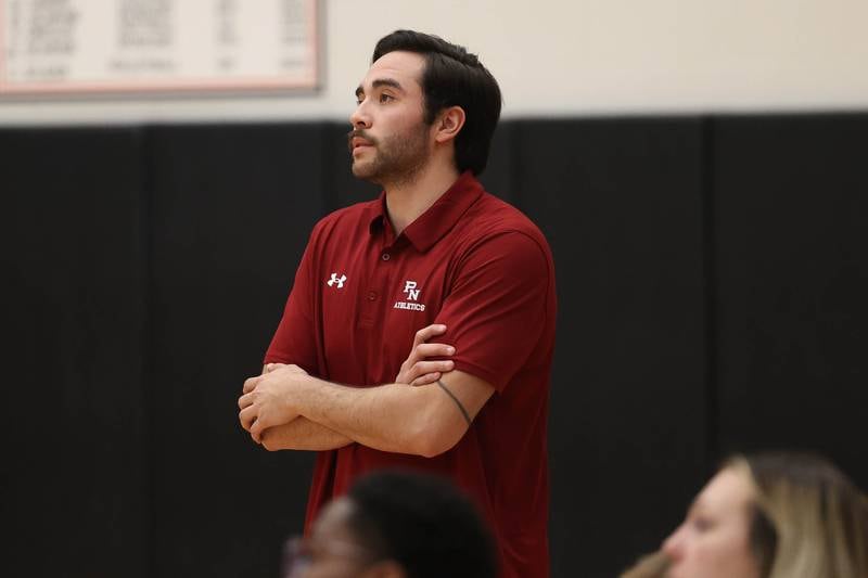 Plainfield North head coach Nick Ramos watches the match against Lincoln-Way West on Monday, March 18, 2024 in New Lenox.