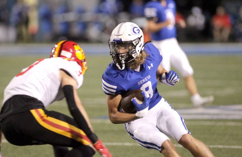 Geneva’s Finnegan Weppner carries the ball during a game against Batavia at Geneva on Friday, Sept. 29, 2023.