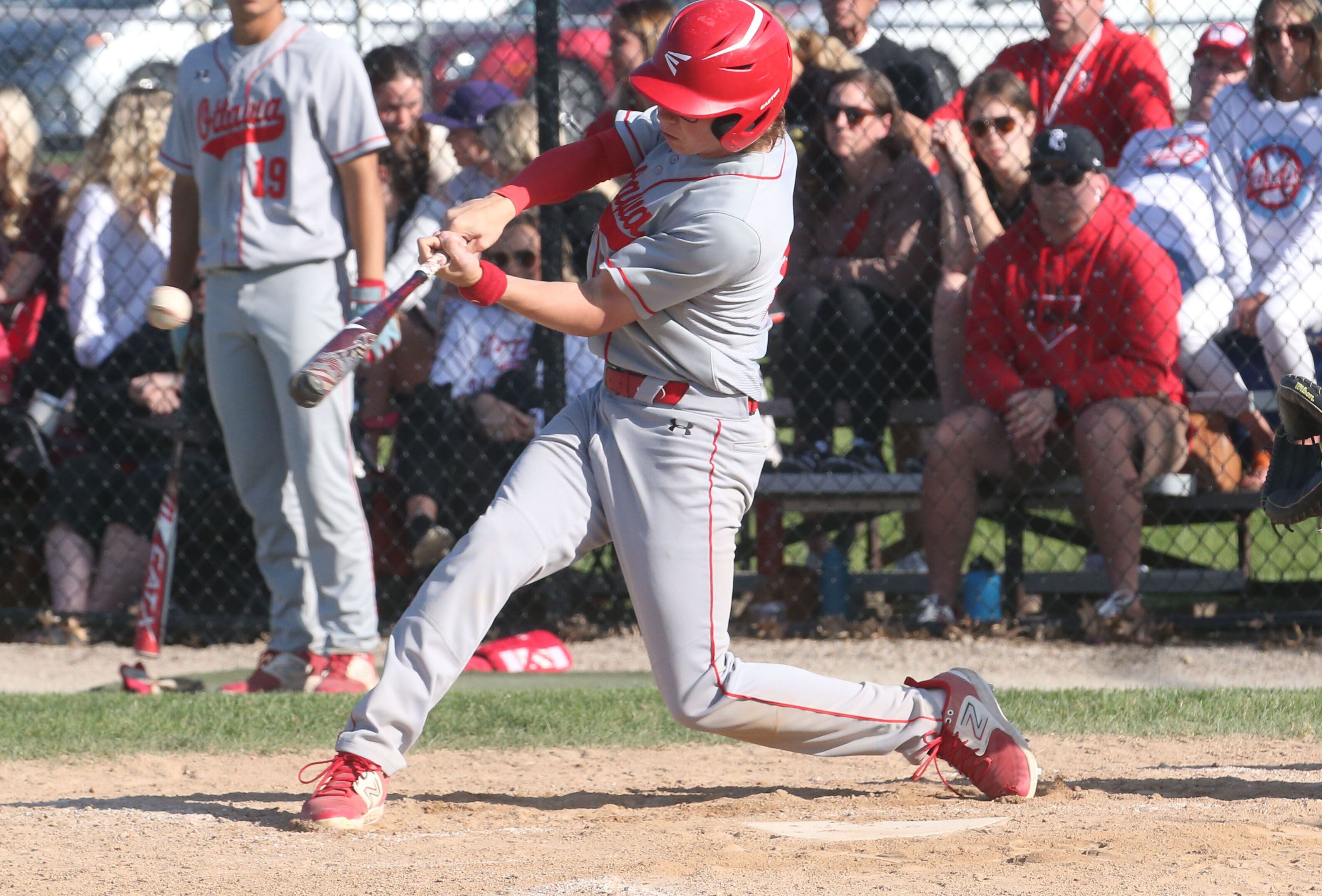 Ottawa's Ryan Chamberlain gets a hit against Rock Island during the Class 3A regional semifinal Thursday, May 25, 2023, at Morris High School. 