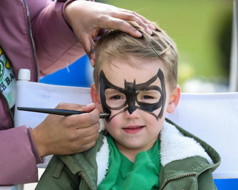 Miles Harper, 5, of Lemont gets his face painted during the St. Patrick’s day festival downtown Lemont on Saturday March 9, 2024.