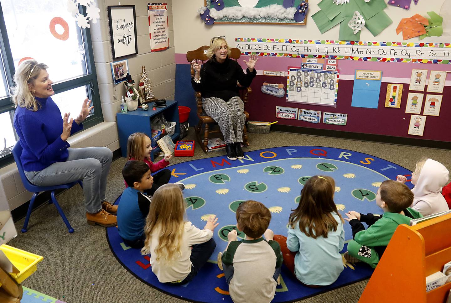 Teachers Cheryl Covert and Lisa Knoeppel teach about today’s weather during circle time on Tuesday Jan. 23, 2024, at the Purple Moose in Crystal Lake. The preschool will close down after the current school year finishes in June, unless the school can find another location after the Shiloh Church decided not to renew the preschool's lease.