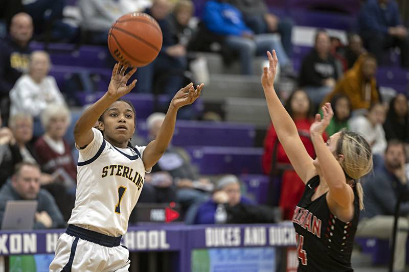 Sterling’s Taah Liberty puts up a shot against Stillman Valley’s Amelia Dunseth Thursday, Dec. 28, 2023 at the Dixon KSB Holiday tournament.