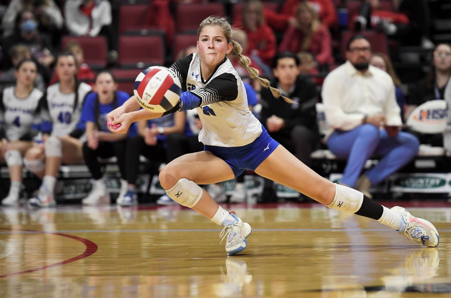 St. Francis’ Anna Paquette reaches for a shot by Lincoln in the Class 3A girls volleyball state championship match at Illinois State University in Normal on Saturday, October 11, 2023.
