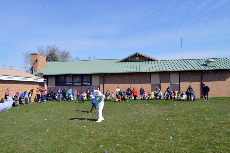 The Easter Bunny signals for children participating in the Easter egg hunt outside the Bertolet Building to start. The Leaf River Lions Club hosted a Breakfast with Bunny and the Easter egg hunt on April 8, 2023.