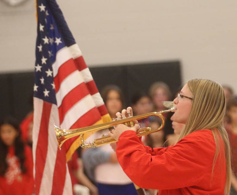 Kailey Harper a student at Parkside School, plays "Taps" during the Parkside School Veterans Day Program on Friday, Nov. 10, 2023 at Parkside Middle School in Peru.