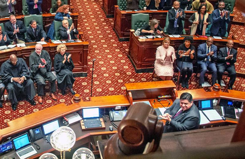 Gov. JB Pritzker is pictured during a previous State of the State address in the Illinois House chamber. He’ll give his 2024 address – his sixth as governor – on Wednesday, Feb. 21